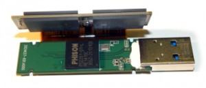 Bare internals of a 256GB USB flash drive showing 4 NAND chips