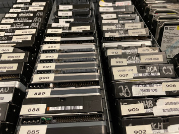 Drawer full of Western Digital IDE hard drives on end