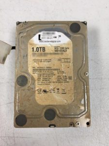 A hard drive with severe flood damage