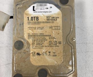 A hard drive with severe flood damage
